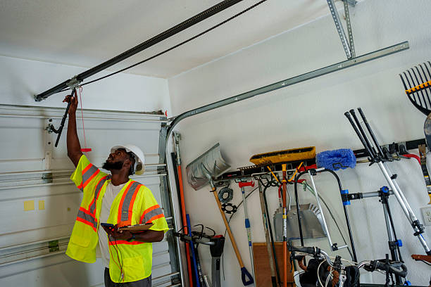 Professional Garage Door Panel Replacement technician working in Elkhart, TX